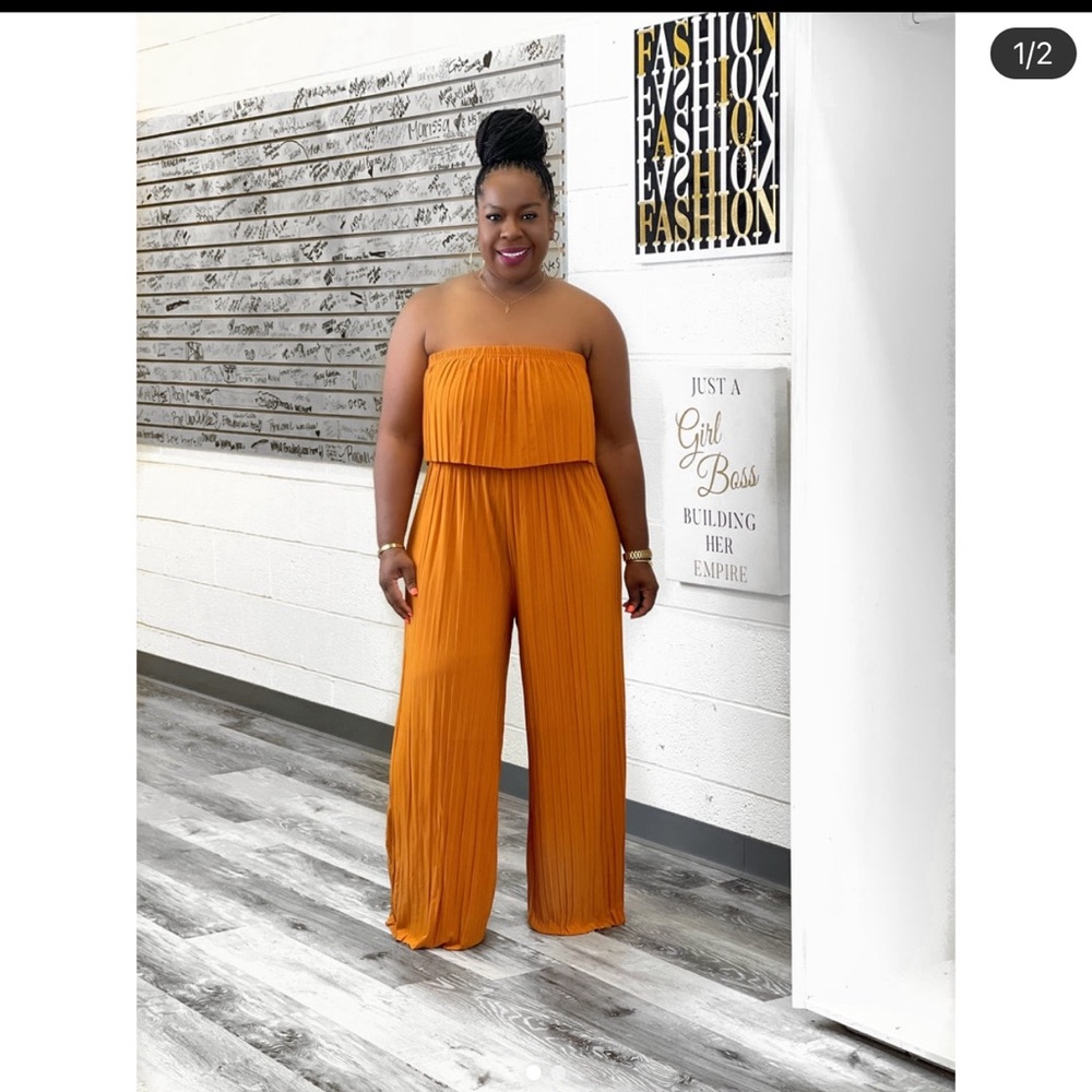 Women jumpsuit size Medium (color ginger) brand new never worn